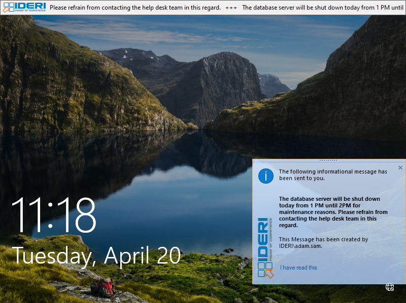 The Windows® 10 lock screen showing a message window and the ticker